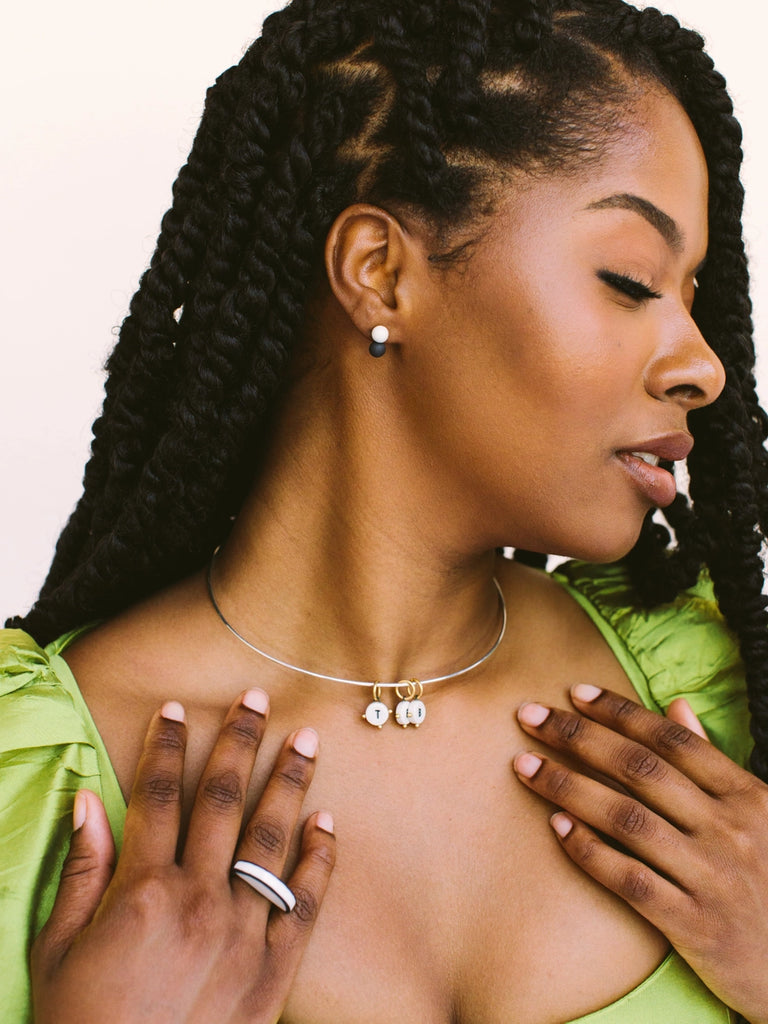 A charm handmade locally in Charlotte, NC (North Carolina), at a Plaza Midwood woman owned jewelry art and home decor gift shop. Book our bracelet bar, it's great for your bridal or baby shower, and bachelor/bachelorette parties. A can't miss thing to do - order a housemade vegan chai at The Chai Window to sip while you shop. 