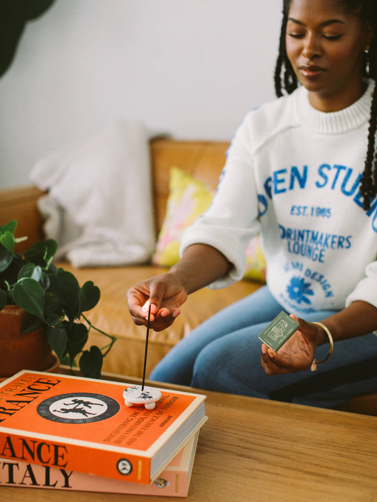 An incense holder, handmade locally in Charlotte, NC (North Carolina), at a Plaza Midwood woman owned jewelry art and home decor gift shop. A can't miss thing to do - order a housemade vegan chai at The Chai Window to sip while you shop. 