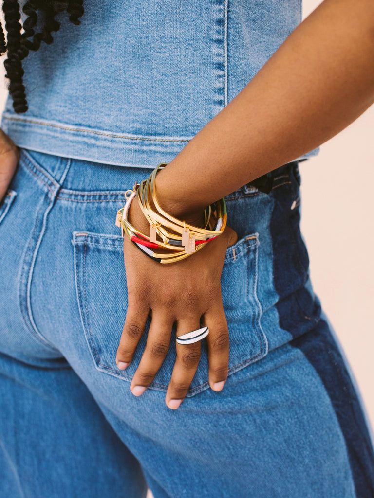 Wrapped bangles for formal and casual wear, handmade locally in Charlotte, NC (North Carolina), at a Plaza Midwood woman owned jewelry art and home decor gift shop. A can't miss thing to do - order a housemade vegan chai at The Chai Window to sip while you shop. 