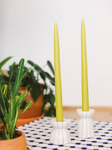 Candle stick holders, handmade locally in Charlotte, NC (North Carolina), at a Plaza Midwood woman owned jewelry art and home decor gift shop. A can't miss thing to do - order a housemade vegan chai at The Chai Window to sip while you shop. 