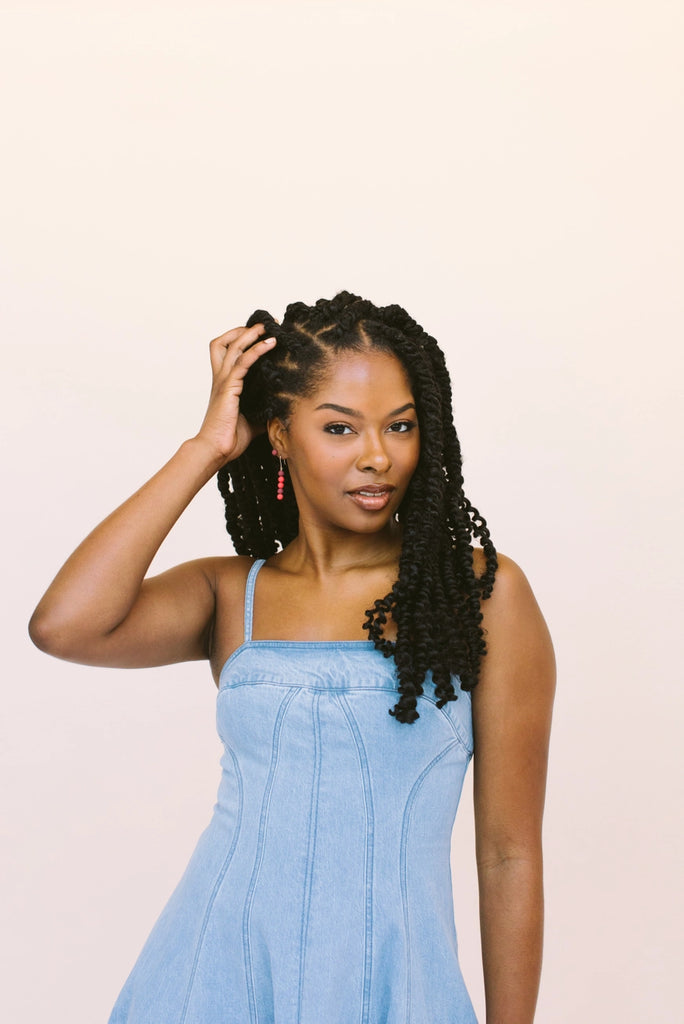 Stacking dot earrings shown in cherry (red and plum (purple/burgundy), handmade locally in Charlotte, NC (North Carolina), at a Plaza Midwood woman owned jewelry art and home decor gift shop. A can't miss thing to do - order a housemade vegan chai at The Chai Window to sip while you shop. 