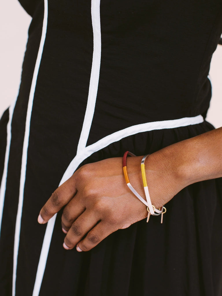 Colorful bangles, handmade locally in Charlotte, NC (North Carolina), at a Plaza Midwood woman owned jewelry art and home decor gift shop. A can't miss thing to do - order a housemade vegan chai at The Chai Window to sip while you shop. 